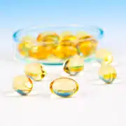 tran dla dzieci w kapsułkach na błękitnym tle